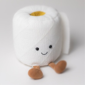 Jellycat white plush toilet roll soft toy with smiley face, yellow centre, and small brown feet