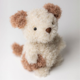 Jellycat light brown fluffy puppy soft toy with cream and tan fur, seated pose, small bean-shaped nose