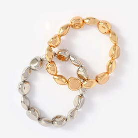 Mint Velvet Two-pack Mixed Metal Beaded Bracelets in gold and silver tones, featuring organic nugget-shaped beads in pull-on style
