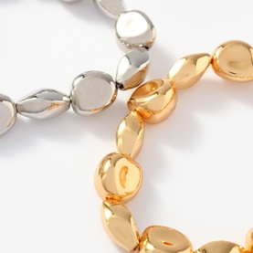 Mint Velvet Two-pack Mixed Metal Beaded Bracelets in gold and silver tones, featuring chunky polished nugget-style beads