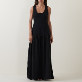 Model wearing Odd Muse Dropped Waist Flared Dress in black, sleeveless tank-style bodice, flared maxi skirt, round neckline