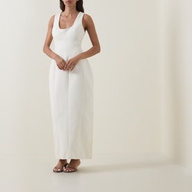 Model wearing Odd Muse Volume Sculpted Dress in ecru, sleeveless midi with scoop neckline and waist cinch, styled with metallic flat sandals