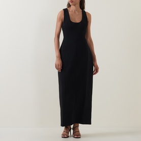 Model wearing Odd Muse Volume Sculpted Dress in black, sleeveless midi length with scoop neckline and waist cinch, styled with strappy heeled sandals.