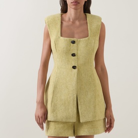 Model wearing Odd Muse Boucl&eacute; Tailored Waistcoat in chartreuse with square neckline, structured shoulders, and front button fastening, styled with