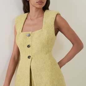 Model wearing Odd Muse Boucl&eacute; Tailored Waistcoat in chartreuse, featuring square neckline, structured shoulders, and front button fastening.