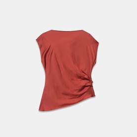 Rust red sleeveless top with asymmetric gathered hem detail and boat neckline, laid flat on white background.