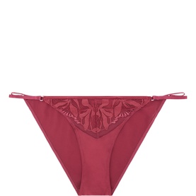 Calvin Klein brief in Established Red with floral lace panel and adjustable tie sides, no model