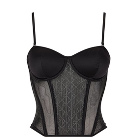 Calvin Klein black corset bra with sheer mesh monogram panel, underwire cups, and adjustable spaghetti straps