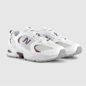 New Balance 530 trainers in white and brown, featuring mesh and leather upper, chunky white midsole with burgundy logo and heel accents