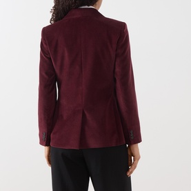 Model wearing Max Mara Weekend Bordeaux cotton blazer, rear view, with black trousers. Single vent, button cuffs.