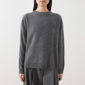 Model wearing Max Mara Weekend dark grey wool cashmere blend crew neck jumper, styled with wide-leg grey trousers.
