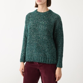 Model wearing Max Mara Weekend Hobby Knitted Sweater in dark green textured knit with crew neck and ribbed trims, styled with burgundy trousers.