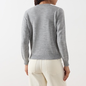 Model wearing Max Mara Weekend light grey alpaca blend crew neck knit sweater, back view, styled with cream trousers.