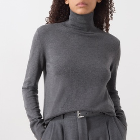 Model wearing Max Mara Weekend Kiku Turtleneck Sweater in dark grey, fine ribbed roll neck, long sleeves, styled with matching wide-leg trousers.