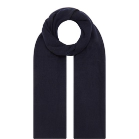 Soft Goat navy cashmere scarf, plain knit with ribbed edges, laid flat in rectangular shape.