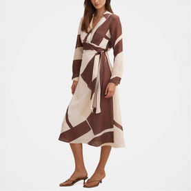 Model wearing Forever New Driftwood Geo midi wrap dress with long sleeves and self-tie belt, styled with tan heeled mules