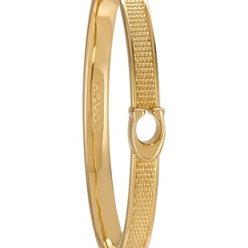 Coach Logo Textured Hinge Bangle Bracelet in shiny gold with textured finish, hinge closure, and signature logo detail on brass band