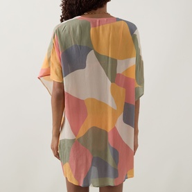 Model wearing Eres Nuance Printed Kaftan in multi colourway, short sleeves, V-neckline, abstract print, rear view shown