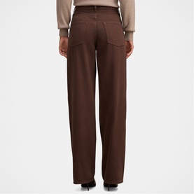 Model wearing Forever New chocolate wide-leg trousers, rear view, styled with a beige knit top.