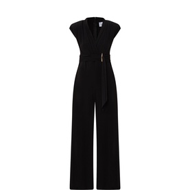 Joseph Ribkoff black wide-leg jumpsuit with V-neckline, cap sleeves, tie waist belt, and gold-tone hardware detail