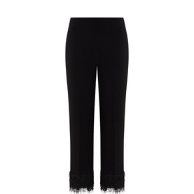 Joseph Ribkoff black cropped trousers with feather-trim hem detail, elasticated waistband, straight-leg silhouette