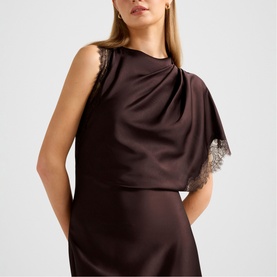 Model wearing Forever New Dark Chocolate satin dress with draped overlay and lace trim detailing at hem and shoulder.