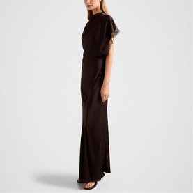 Model wearing Forever New dark chocolate maxi dress with feather trim short sleeves and relaxed drape silhouette