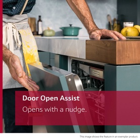 Neff N70 Built-In Dishwasher 60cm Door Open Assist feature demonstration, showing door opening with a gentle nudge in a modern kitchen setting.