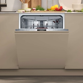Neff N70 Built-In Dishwasher 60cm with Variable Hinge, open door revealing inner rack, integrated into beige kitchen cabinetry