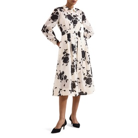 Model wearing Phase Eight white midi shirt dress with black floral and grid print, long sleeves, belted waist, styled with black heels