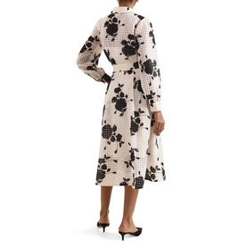 Model wearing Phase Eight white floral print midi dress with long sleeves and A-line skirt, styled with black kitten heel mules, back view.