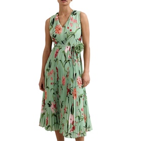 Model wearing green floral sleeveless midi dress with pleated skirt and tie waist belt