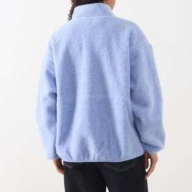 Model wearing American Vintage Hoktown Logo Fleece Jacket in Givre Chine, shown from behind, with zip fastening and side pockets visible