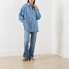 Model wearing American Vintage shirt in authentique stone with matching denim jeans and tan loafers