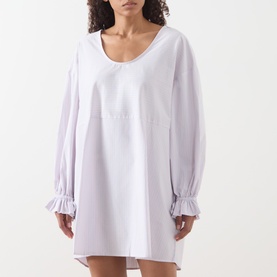Model wearing AMERICAN VINTAGE Soabird Striped Tunic in Rayures Douceur, scoop neck, long sleeves with elasticated frill cuffs, mini length