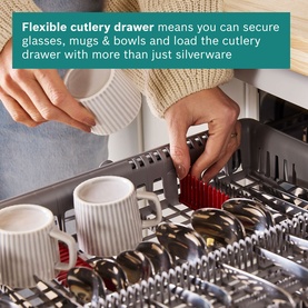 Flexible cutlery drawer in dishwasher loaded with mugs, bowls and silverware, demonstrating versatile loading capacity.