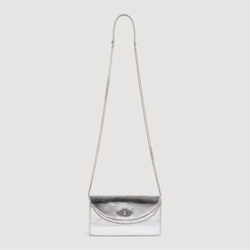 Sandro black crossbody bag with silver chain strap and twist-lock closure, envelope silhouette with metallic finish