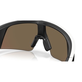Oakley white wraparound sunglasses with dark bronze shield lens, close-up detail showing nose bridge and ventilation port.