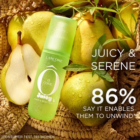 Lanc&ocirc;me &Ocirc; Oui Juicy Body Mist in green bottle surrounded by fresh pears, with 86% consumer test claim overlay