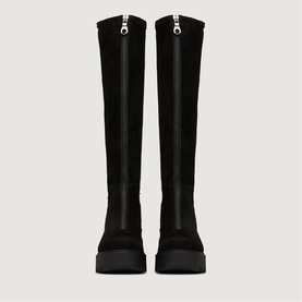 Black knee-high boots with silver zip detail, chunky black platform sole, shown from front angle as a pair