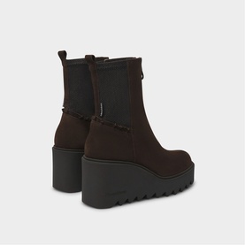 Marco Moreo brown suede platform wedge ankle boots with shearling trim detail and chunky black lugged sole, rear view