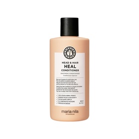 Maria Nila Head & Hair Heal Conditioner in a peach-toned bottle with black cap, 300ml