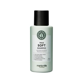 Maria Nila True Soft Shampoo in a small sage green travel-size bottle with black cap