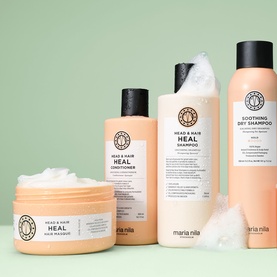 Maria Nila Head & Hair Heal haircare collection including shampoo, conditioner, hair masque and dry shampoo in peach packaging