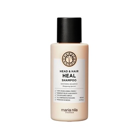 Maria Nila Head & Hair Heal Shampoo in a small cream-coloured bottle with black cap, 100ml travel size