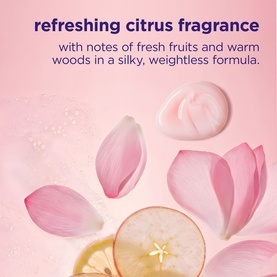 Maria Nila shampoo refreshing citrus fragrance detail showing pink flower petals and sliced citrus fruit on a pink background