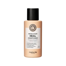 Maria Nila Head & Hair Heal Conditioner in a cream travel-sized bottle with black cap