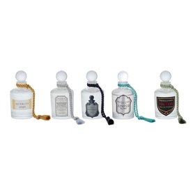 Penhaligon Fragrance Set of five miniature white glass bottles with decorative tassel stoppers and varied labels