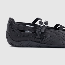 Puma black croc mary-jane flat shoe with double buckle straps, textured sole, and cut-out detail, in black leather finish