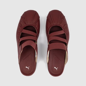Puma red slip-on sandals with triple cross straps, overhead flat lay showing insole and Puma logo branding